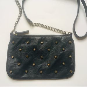 BONGO black leather and aged brass studded bag.